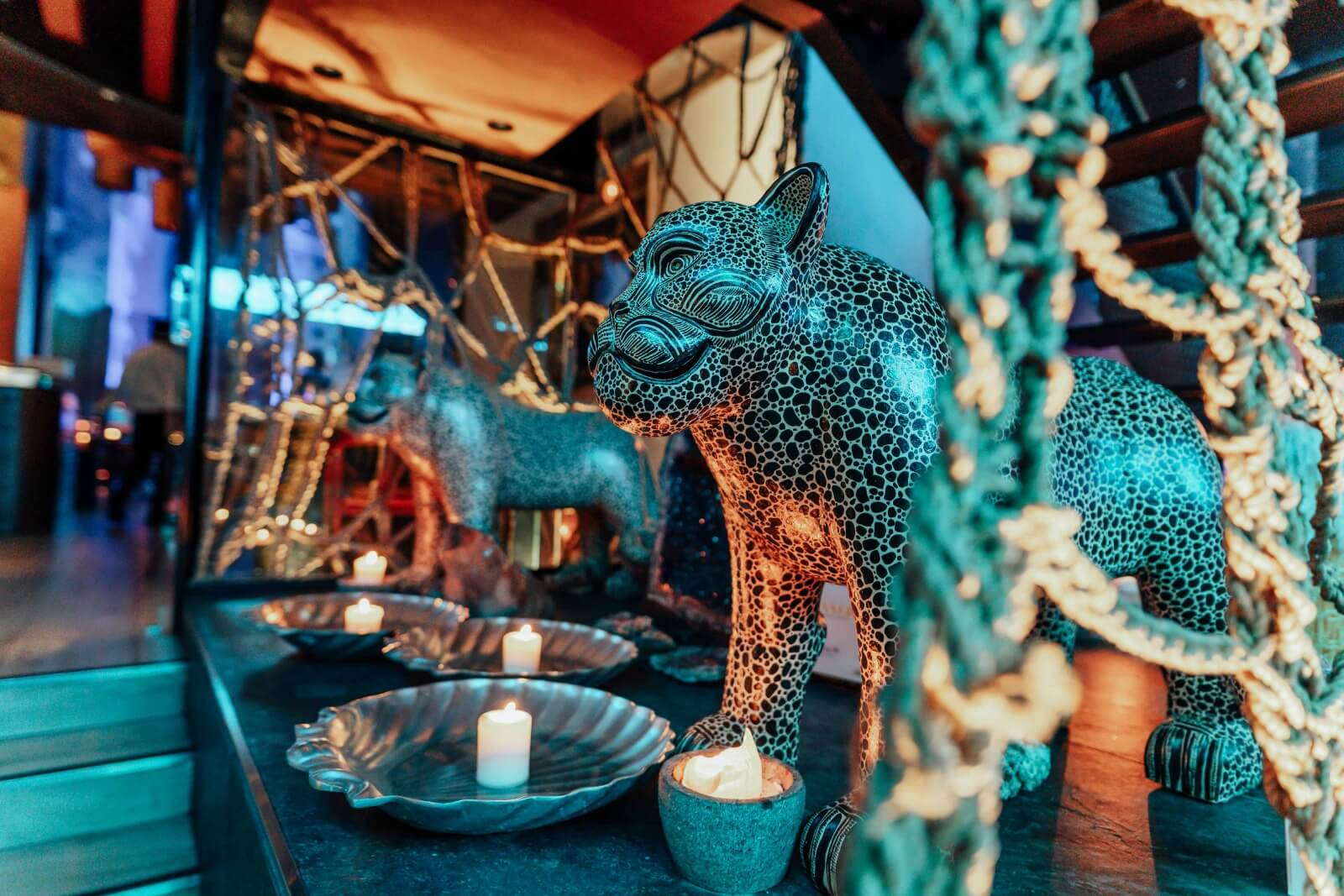 The jaguar mural and main wall of the Puerto 99 dining room